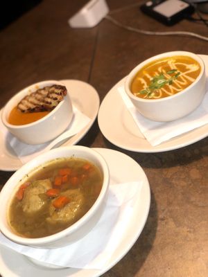 Choices of soup: matzo ball ; roasted butternut squash and tomato bisque  at The Organic Grill in New York City