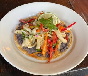 🚨New Appetizer🚨Ceviche Tostada: marinated young coconut meat, peppers. Served two on corn tortillas with black bean spread  at The Organic Grill in New York City