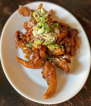 Gluten Free OGicken Tenders : Fried Crusted Oyster Mushroom  are served three different options: Kung Pao (sweet & sour), Buffalo & Sriracha Mayo  at The Organic Grill in New York City