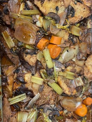 Seitan Brisket with veggies and gravy . Preparation for Hanukkah catering  at The Organic Grill in New York City