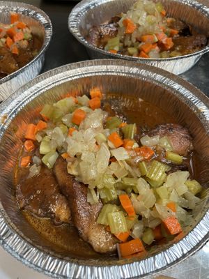 Seitan Brisket with veggies & gravy. Preparation for Hanukkah catering. at The Organic Grill in New York City