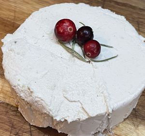 Cashew Brie Round. Served with Cranberry Sauce. Can be pre order online  at The Organic Grill in New York City