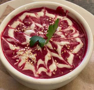 Beet Soup with sunflower sour cream drizzle   at The Organic Grill in New York City