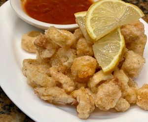 Fried Calamari (heart of palms) . Served with house made marinara   at The Organic Grill in New York City