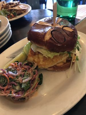 Breakfast Omelette Burger served on pretzel bun .  at The Organic Grill in New York City