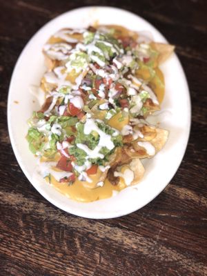 Macho Nachos with house made cheese and Corn Chips  at The Organic Grill in New York City