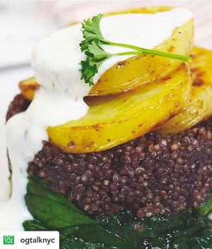 Red wine quinoa on wilted spinach with potatoes and tahini dressing  at The Organic Grill in New York City