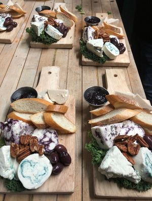 Valentines Day : house made vegan blue cheese , lavender blueberry chèvre, fresh mozzarella paired w kalamata olives,pecans, jam and toasted baguette  at The Organic Grill in New York City