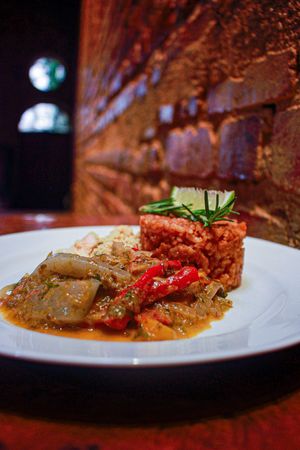 Moqueca Bandolim with tomato rice made of a asian potato at Bandolim in Rio De Janeiro