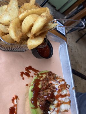 Avocados, stuffed brisket and fries   at San Juan Smokehouse in San Juan