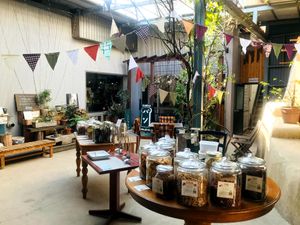 Weekend Market Event where they sell various items in bulk in the garden. Organic Vegetables and drinks also available. at Cafe Slow in Tokyo