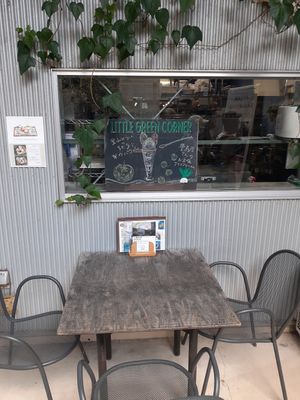 Seating in front of entrance at Cafe Slow in Tokyo