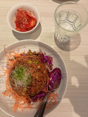 I vegan olive fried rice (bit bland on own but very good with pickle added) 🤤 the pickle and warm water are complimentary at iVegan 爱素 - Thomson Plaza in Central Singapore