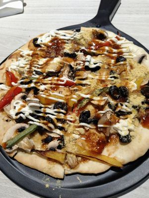 BBQ pizza $15.90++. I find the sauce too sweet and the base not crisp at iVegan 爱素 - Thomson Plaza in Central Singapore