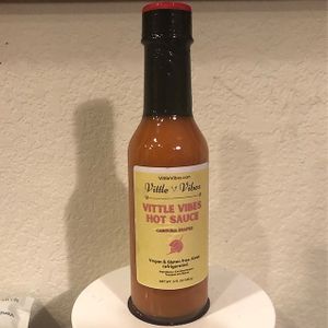 Vittle Vibes Hot Sauce: Vegan 🌱. A blend of spices, tomatoes and the world’s hottest pepper, Carolina Reaper ! No artificial flavors/preservatives ALL NATURAL AND PLANT-BASED at Vittle Vibes in Leander