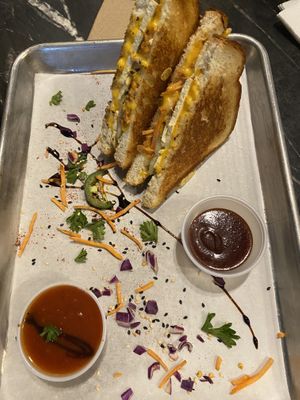 Vegan grilled cheese with the kimchi sauce on the side  at The Grilled Cheese Gallery in St Augustine