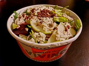 Salad with apples and almond feta at Vivino in Haifa