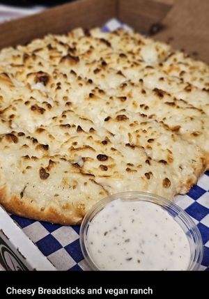 Vegan cheezy breadsticks and vegan ranch at Pizza Twist in Roseville