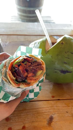 Veggie Roti and Coconut Juice at Fancy I Naturals in Pompano Beach