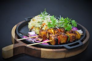 Fried Rice with Herb and Vegan Meat Satay at Vegan World Peace by Loving Hut in Reykjavik