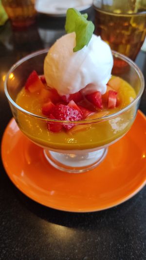 Thai Panna cotta with mango and coconut ice cream 💞 at Vegan World Peace by Loving Hut in Reykjavik