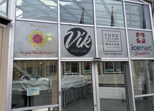 Small sign outside on front door    at Vegan World Peace by Loving Hut in Reykjavik