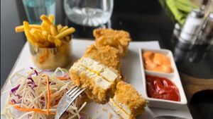 Tofu with vegan cheese   at Vegan World Peace by Loving Hut in Reykjavik