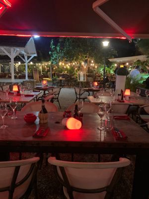 Outdoor seating  at La Trattoria in Orient Bay