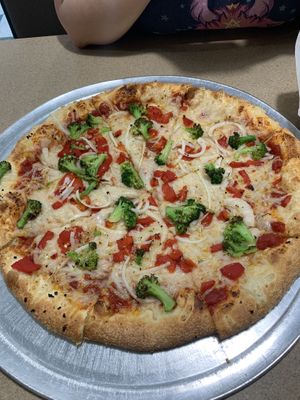 Large vegan cheese pizza with broccoli, onion, red peppers and crushed garlic. at Constantly Pizza in Concord