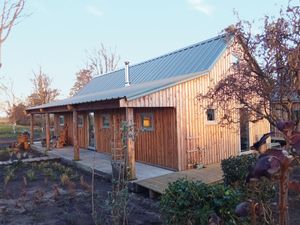 The cottage, build in 2020. Spacious with 3 bedrooms, livingroom, bathroom and we share the garden with you at De Groene Gevel in Woerdense Verlaat