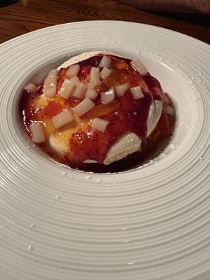 Vegan pavlova with an aquafaba merengue and fresh fruit  at Moonshine 152 in Boston