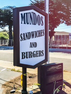 Street sign  at 3 Mundos in Monterey