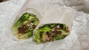 Falafel wrap made vegan at 3 Mundos in Monterey