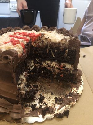 German chocolate cake cross-section  at Three Girls Vegan Creamery - Downtown in Guilford
