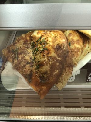 Vegan pesto pizza, so GOOD that I forgot to take the picture before eating it 🤤  at Three Girls Vegan Creamery - Downtown in Guilford