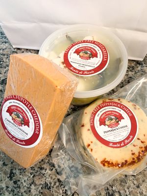 Chipotle cheddar, marinated mozzarella and pepperjack! at Three Girls Vegan Creamery - Downtown in Guilford