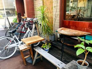 outdoor seating and bicycle area at Woodberry Coffee - Setagaya in Tokyo