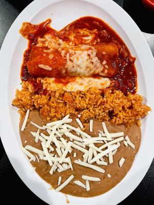 Chickun red sauce enchilada. Rice and beans were delicious✨  at Mamicon's Vegan Mexican Restaurant in Northridge