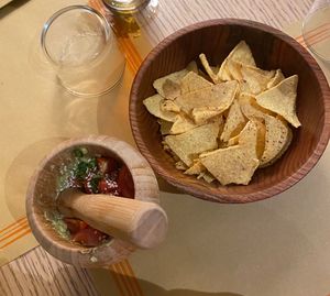 Vegan guacamole with chips  at Handa in Padua