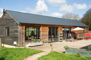 Outdoor space with ample seating and fire pit. at On The Brook in Bruton