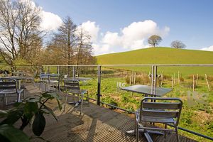 Balcony for relaxed dining. at On The Brook in Bruton