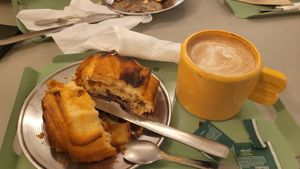 Pan de chocolate y capuchino con leche de castañas y avena at Bioma in Buenos Aires