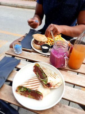 Beetroot wrap, beyond burger, dragonfruit smoothie and kombucha ginger♡ at Alive Bistro in Marsalforn