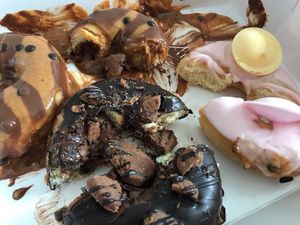 Schokocreme (left), peanutbutter chocolate (right), unfilled (bottom) at Royal Donuts in Leipzig