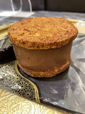 Dates and cacao gelato sandwich with spelt cookies. at Carvaan Delicatessen in Yokohama
