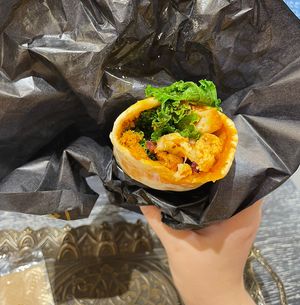 Inside of the wrap had lots of veggies and delicious sauce.   at Carvaan Delicatessen in Yokohama