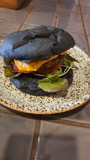 Veg mushroom burger with carrot and tomatos gravy at The Secret Brunch in Koh Samui