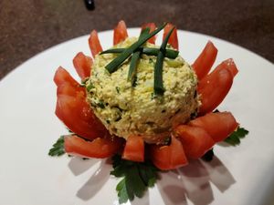 'egg' salad in a tomato bowl.  at Nourish Deli & Bakery in St Albans