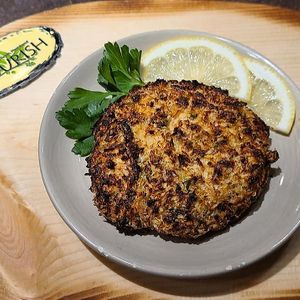 a 'crab' cake, buy to take home and cook yourself- this was cooked in an airfryer.  at Nourish Deli & Bakery in St Albans