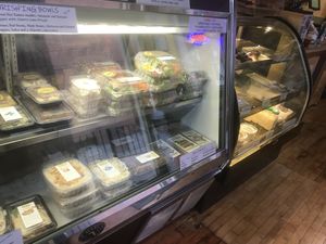 Other half of grab and go and a snip of the baked goods case to the right. Make sure to get a baked good before they sell out for the day! at Nourish Deli & Bakery in St Albans